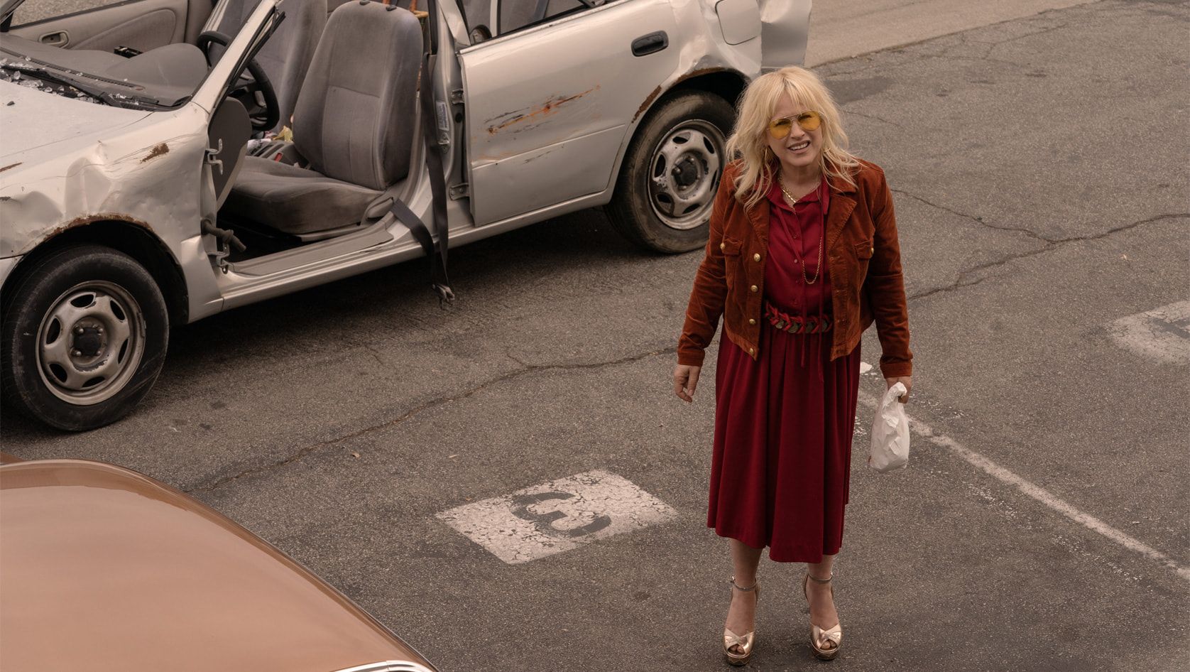 patricia arquette high desert standing by car looking up